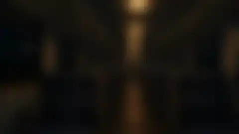 Blurred preview of a quiet train carriage at night